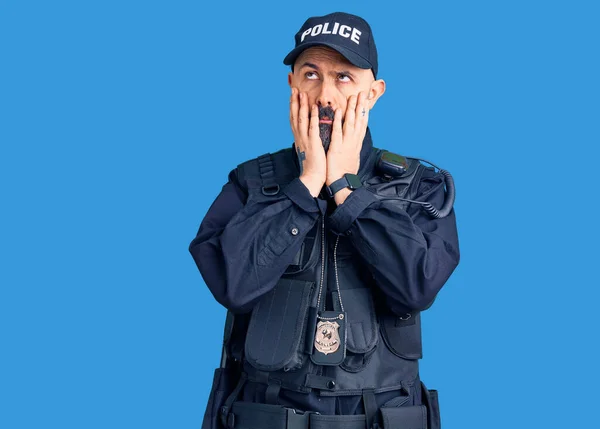 Jovem Bonito Homem Vestindo Polícia Uniforme Cansado Mãos Cobrindo Rosto — Fotografia de Stock