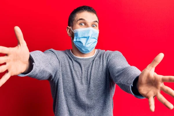 Young Handsome Man Wearing Medical Mask Looking Camera Smiling Open — Stock Photo, Image