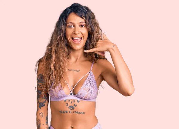 Young Hispanic Woman Tattoo Wearing Lingerie Smiling Doing Phone Gesture — Stock Photo, Image