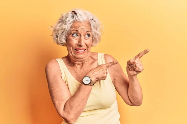 Senior Grey Haired Woman Wearing Casual Clothes Pointing Aside Worried — Stock Photo, Image