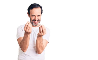 Orta yaşlı yakışıklı bir adam, günlük tişört giyer, para kazanır, elleriyle jest yapar, maaş ister, milyoner iş ister. 