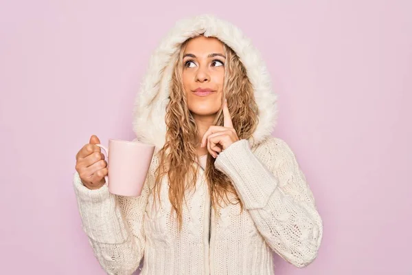 Young Beautiful Blonde Woman Wearing Casual Sweater Hood Drinking Cup — Stock Photo, Image