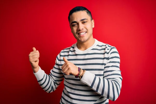 Young Brazilian Man Wearing Casual Striped Shirt Standing Isolated Red — Stock Photo, Image