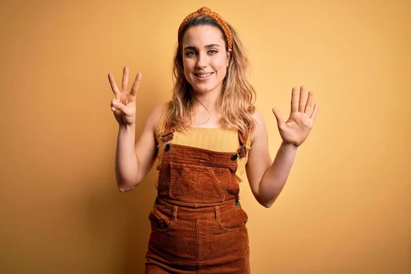 Young Beautiful Blonde Woman Wearing Overalls Diadem Standing Yellow Background — Stock Photo, Image