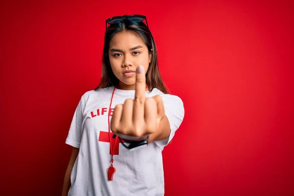 Young Asian Lifeguard Girl Wearing Shirt Red Cross Using Whistle — Stockfoto
