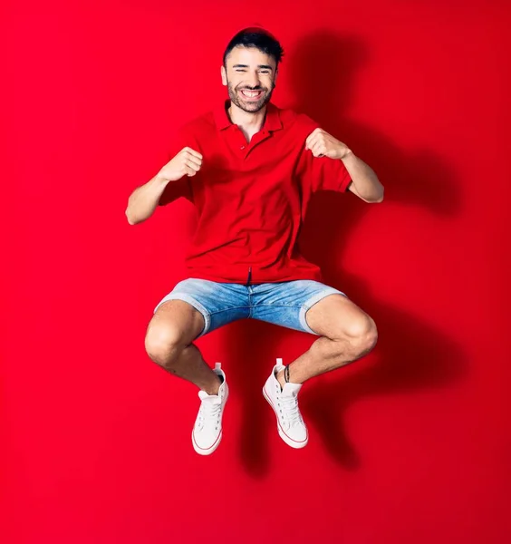 Young Handsome Deliveryman Wearing Cap Smiling Happy Jumping Smile Face — Stock Photo, Image