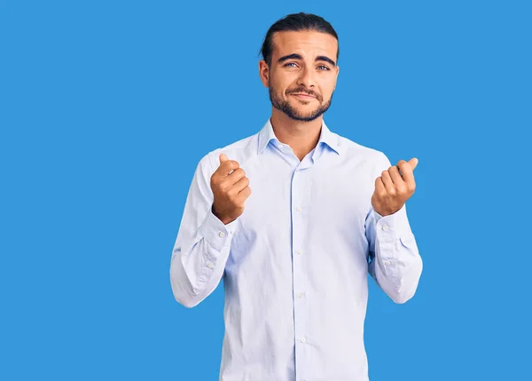 Joven Hombre Guapo Vistiendo Ropa Negocios Haciendo Gesto Dinero Con —  Fotos de Stock