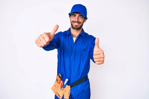 Handsome Young Man Curly Hair Bear Weaing Handyman Uniform Approving — Stock Photo, Image