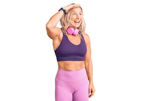 Middle Age Fit Blonde Woman Wearing Gym Clothes Using Headphones — Stock Photo, Image
