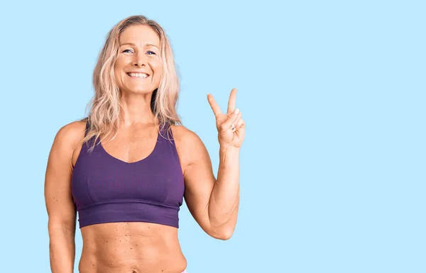 Middle Age Fit Blonde Woman Wearing Sportswear Smiling Happy Face — Stock Photo, Image