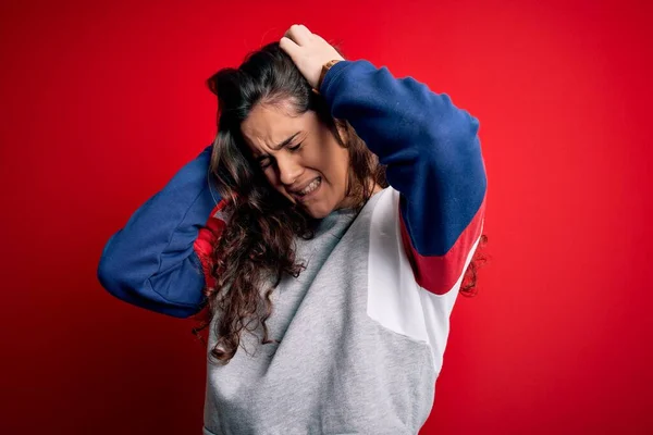 Young Beautiful Woman Curly Hair Wearing Casual Sweatshirt Isolated Red — Stock Photo, Image