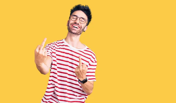 Young Hispanic Man Wearing Casual Clothes Showing Middle Finger Doing — Stock Fotó