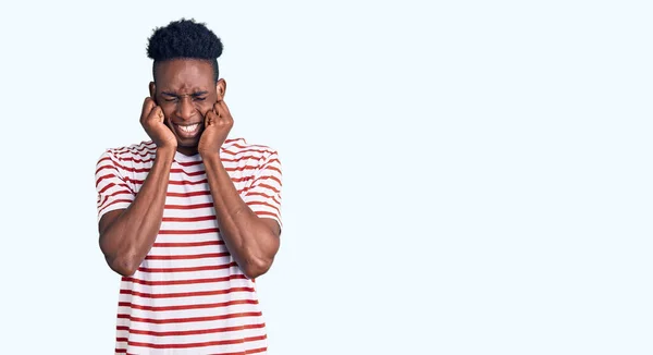 Young African American Man Wearing Casual Clothes Covering Ears Fingers — Stock Photo, Image