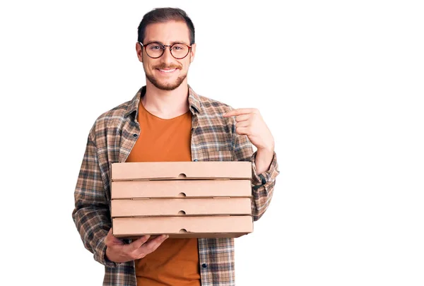 Young Handsome Caucasian Man Holding Delivery Pizza Box Pointing Finger — Stock Photo, Image