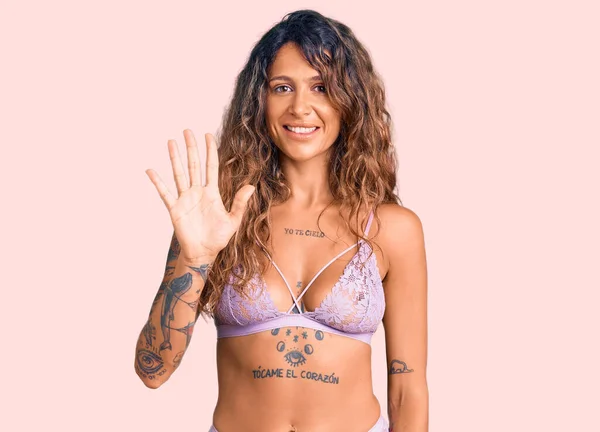 Young Hispanic Woman Tattoo Wearing Lingerie Showing Pointing Fingers Number — Stock Photo, Image