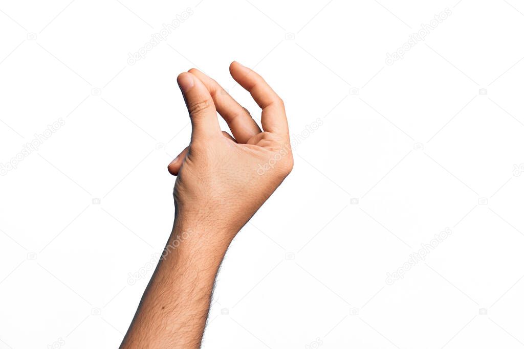 Hand of caucasian young man showing fingers over isolated white background snapping fingers for success, easy and click symbol gesture with hand