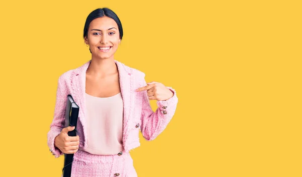 Young Beautiful Latin Girl Wearing Business Clothes Holding Binder Pointing — Stock Photo, Image