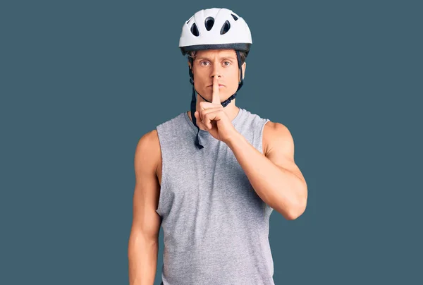 Young Handsome Man Wearing Bike Helmet Asking Quiet Finger Lips — Stock Photo, Image