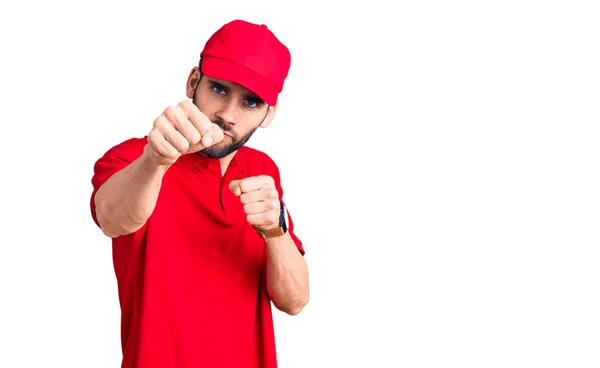 Young Handsome Man Beard Wearing Delivery Uniform Punching Fist Fight — Stock Photo, Image