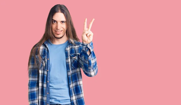 Young Adult Man Long Hair Wearing Casual Shirt Showing Pointing — Stock Photo, Image