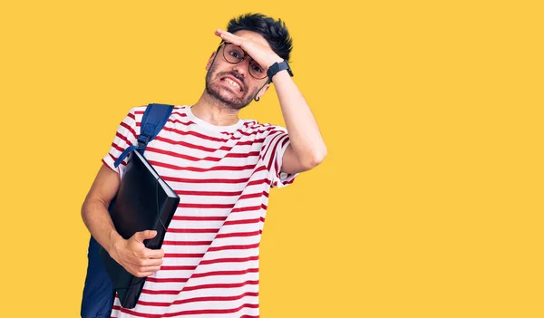 Young Hispanic Man Wearing Student Backpack Glasses Holding Binder Stressed — Stock Photo, Image