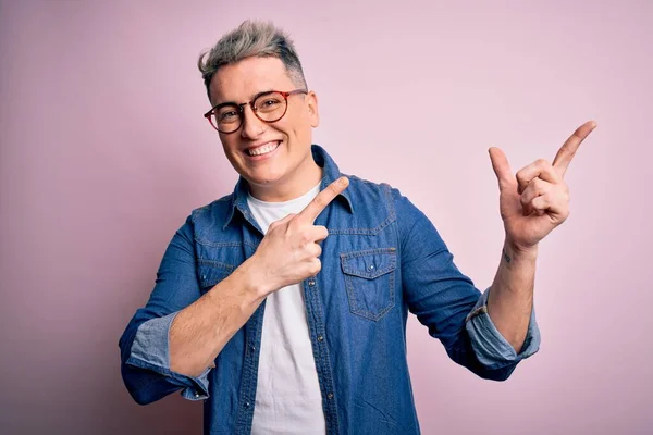 Young Handsome Modern Man Wearing Glasses Denim Jacket Pink Isolated — Stock Photo, Image