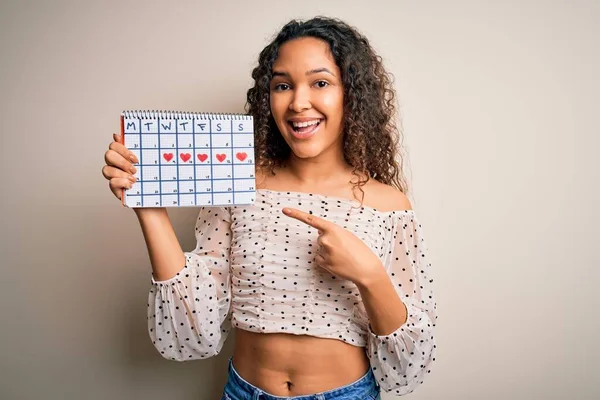 Young Beautiful Woman Curly Hair Holding Mensturation Calendar White Background — 스톡 사진