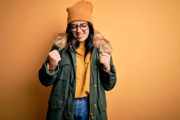 Young Brunette Woman Wearing Glasses Winter Coat Hat Yellow Isolated — Stock Photo, Image