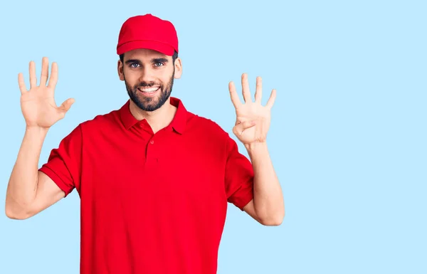 Jovem Homem Bonito Com Barba Vestindo Uniforme Entrega Mostrando Apontando — Fotografia de Stock