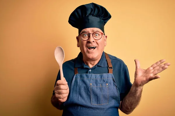 Middle Age Cooker Man Wearing Apron Hat Holding Wooden Spoon — Stock Photo, Image