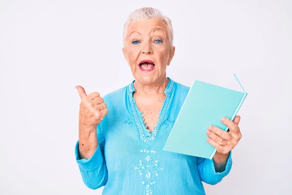 Senior Beautiful Woman Blue Eyes Grey Hair Reading Book Pointing — Stock Photo, Image