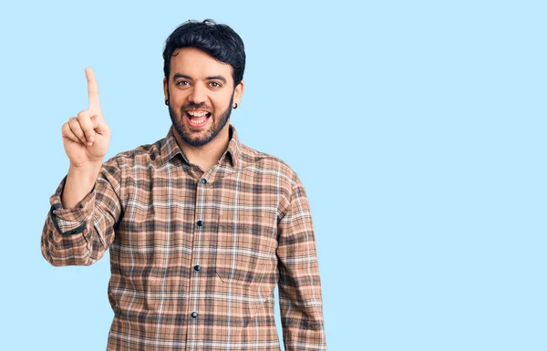 Young Hispanic Man Wearing Casual Clothes Pointing Finger Successful Idea — Stock Photo, Image