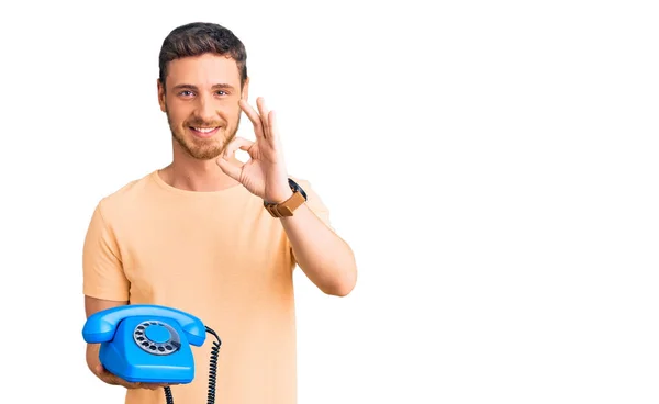 Handsome Young Man Bear Holding Vintage Telephone Doing Sign Fingers — Stock Photo, Image