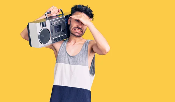 Young Hispanic Man Holding Boombox Listening Music Stressed Frustrated Hand — Stock Photo, Image