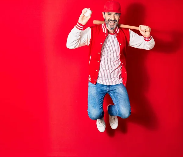 Hombre Guapo Mediana Edad Vistiendo Ropa Deportiva Sonriendo Feliz Saltando —  Fotos de Stock