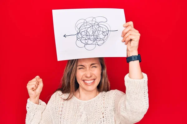 Young Beautiful Blonde Woman Holding Picture Chaos Stress Screaming Proud — Stock Photo, Image
