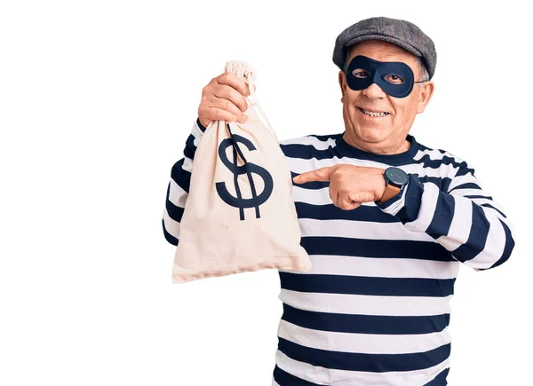 Senior Handsome Man Wearing Burglar Mask Holding Money Bag Smiling — Stock Photo, Image