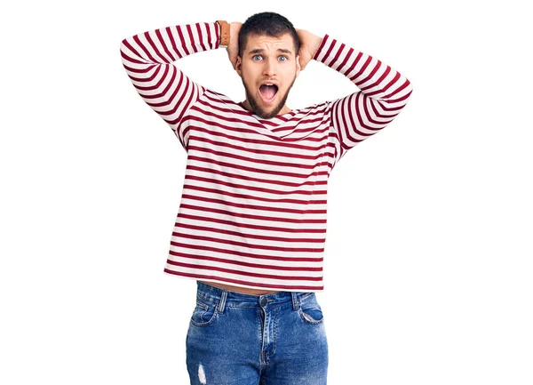 Young Handsome Man Wearing Striped Sweater Crazy Scared Hands Head — Stock Photo, Image