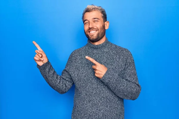 Young Handsome Blond Man Wearing Casual Sweater Standing Isolated Blue — Stock Photo, Image