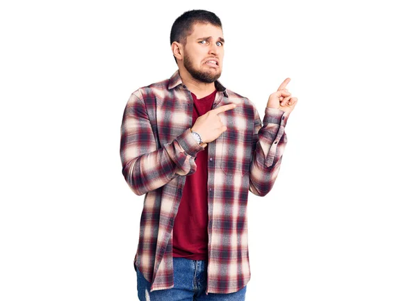 Young Handsome Man Wearing Casual Shirt Pointing Aside Worried Nervous — Stock Photo, Image