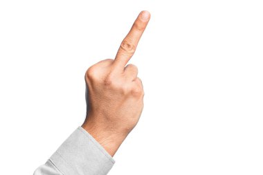 Hand of caucasian young man showing fingers over isolated white background showing provocative and rude gesture doing fuck you symbol with middle finger