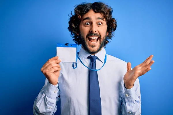 Young Handsome Business Man Beard Holding Card Identification Blue Background — Stock Photo, Image