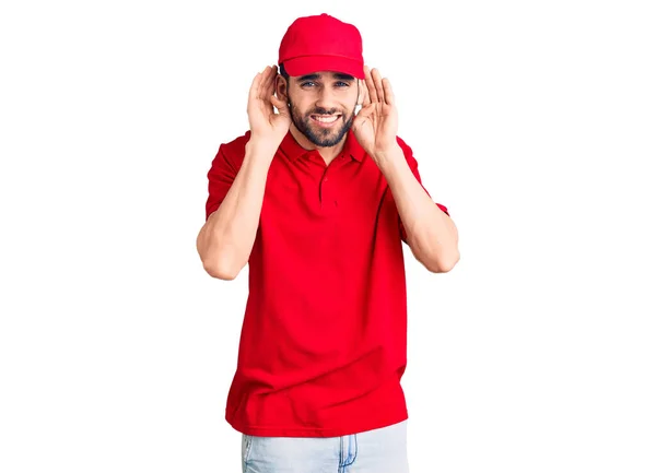 Homem Bonito Jovem Com Barba Vestindo Uniforme Entrega Tentando Ouvir — Fotografia de Stock