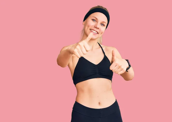 Young Beautiful Blonde Woman Wearing Sportswear Approving Doing Positive Gesture — Stock Photo, Image