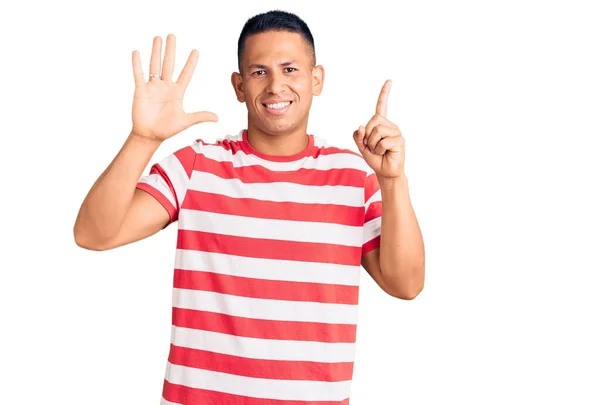 Young Handsome Latin Man Wearing Casual Clothes Showing Pointing Fingers — Stock Photo, Image