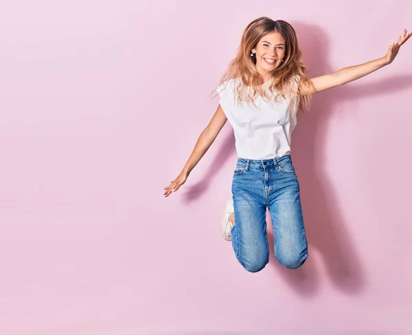 Young Beautiful Woman Wearing Casual Clothes Smiling Happy Jumping Smile — Stock Photo, Image