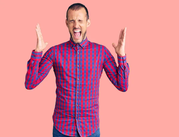 Young Handsome Man Wearing Casual Clothes Celebrating Mad Crazy Success — Stock Photo, Image