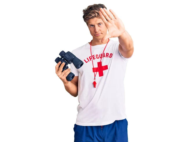 Young Handsome Man Wearing Lifeguard Shirt Using Binoculars Open Hand — Stock Photo, Image