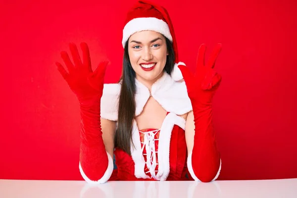 Joven Mujer Caucásica Vistiendo Traje Santa Claus Mostrando Señalando Hacia —  Fotos de Stock