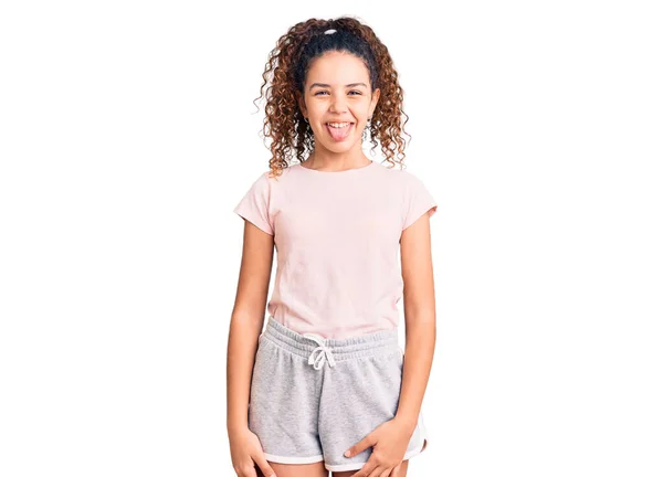 Beautiful Kid Girl Curly Hair Wearing Casual Clothes Sticking Tongue — Stock Photo, Image